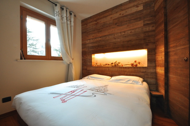 angolo cottura e zona pranzo ristrutturato ristrutturato la thuile valle d'aosta trilocale camera da letto matrimoniale